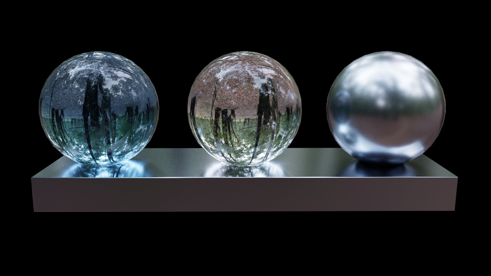 Clear glass, tinted glass and polished metal spheres on a dark slab, rendered in Lumasmith